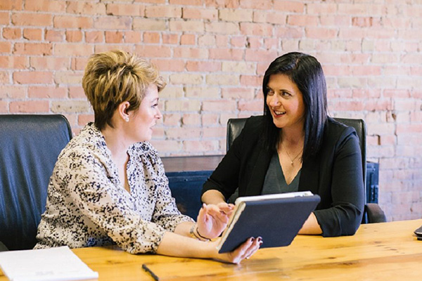 Two women in a conversation